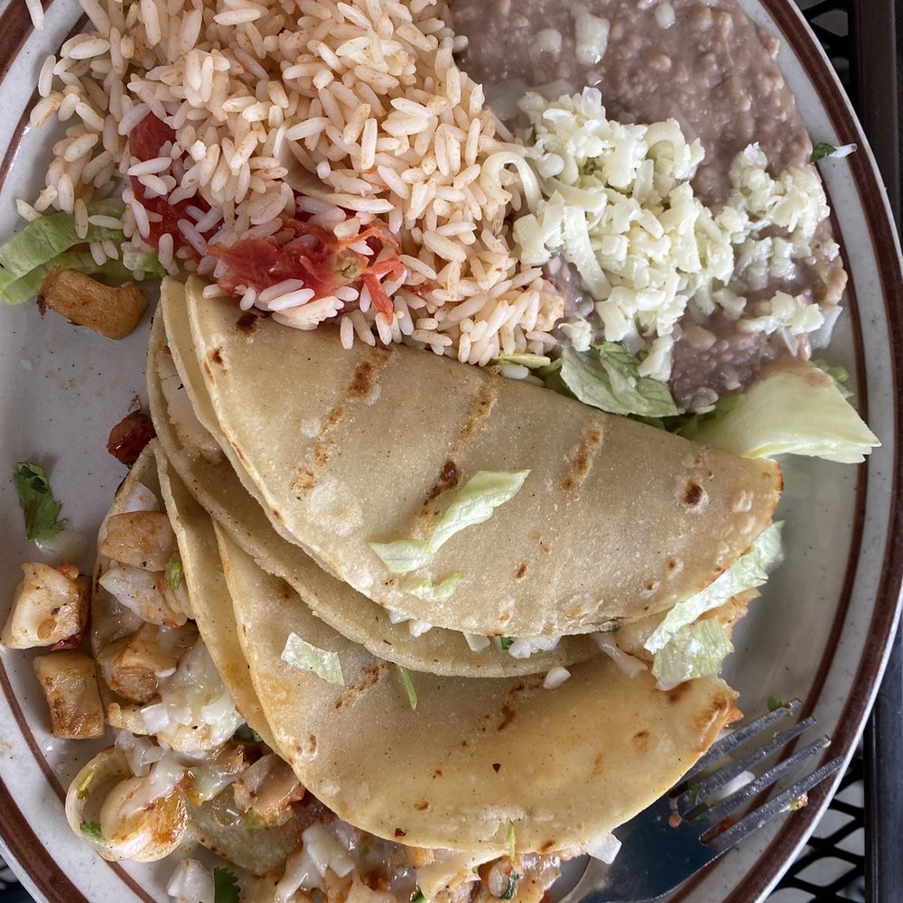 Guadalajara Grill - Fish tacos comes with beans, rice, sour cream and yummy green salsa! - Mexican Near Me - Taos, New Mexico Guadalajara Grill - Fish tacos comes with beans, rice, sour cream and yummy green salsa! - Mexican Near Me - Taos, New Mexico