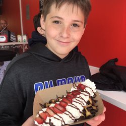 Wonder Waffles - Enjoying a custom strawberry and chocolate waffle.