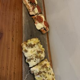 Pepperoni & honey and sausage & potato pizzas Pepperoni & honey and sausage & potato pizzas