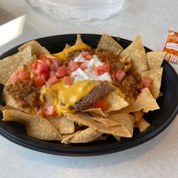 Taco Bell - a plate of nachos on a table - Fast Food Near Me - Indianapolis, Indiana Taco Bell - a plate of nachos on a table - Fast Food Near Me - Indianapolis, Indiana