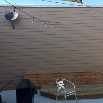 Radio Brewing Company - Outside "screen" for black and white movies. - New American Near Me - Kellogg, Idaho