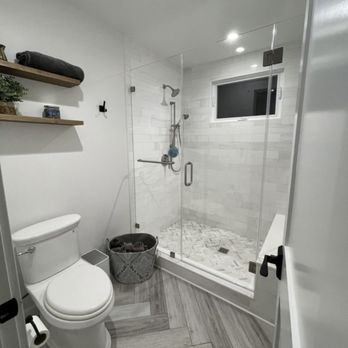 Built Renovation - New beautiful 6ft shower with a bench. Window reframed and replaced! - Plumbing Near Me