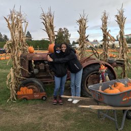 Mom and sister with the pumpkins we picked.
