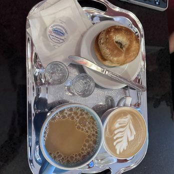 Caffe Amadeus - Large blend coffee and a black and gold latte - Coffee & Tea Near Me - Indiana, Pennsylvania