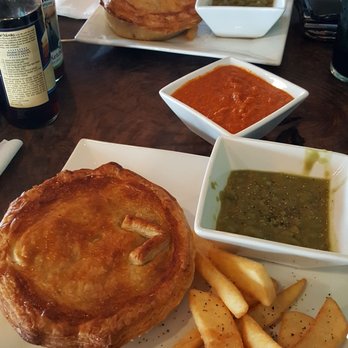 Santiam Brewing - Steak pie and potato, leek, cheese pie with a side of curry for fries. - Brewpubs Near Me - Salem, Oregon Santiam Brewing - Steak pie and potato, leek, cheese pie with a side of curry for fries. - Brewpubs Near Me - Salem, Oregon