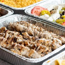 KOVO Greek Street Food - Chicken Souvlaki is a delicious and popular Greek dish that features tender pieces of marinated and grilled chicken skewers.