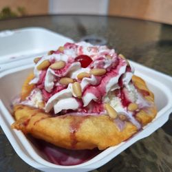 Tiwa Kitchen Restaurant - Pueblo a la mode (frybread, vanilla ice cream, whipped cream, chokecherry syrup, pine nuts)