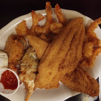 Pappadeaux Seafood Kitchen - Trio stuffed crab, jumbo shrimp and catfish - Cajun/Creole Near Me - Grapevine, Texas