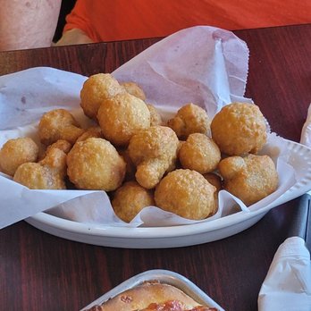 Biscossi's Pizza Time - a person sitting at a table - Pizza Near Me - Ballston Spa, New York Biscossi's Pizza Time - a person sitting at a table - Pizza Near Me - Ballston Spa, New York