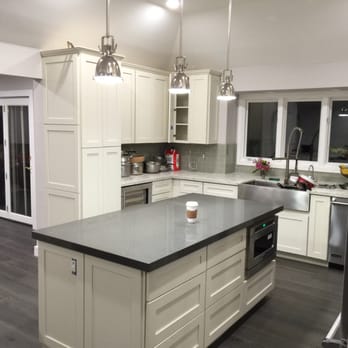 Bay Custom Countertops - This island top was a solid color to add a dramatic pop but not take away from the beauty. - Countertop Installation Near Me - Newark, California Bay Custom Countertops - This island top was a solid color to add a dramatic pop but not take away from the beauty. - Countertop Installation Near Me - Newark, California