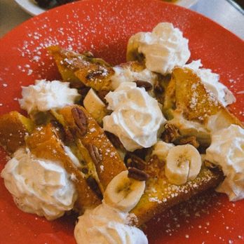 Nibbley's Cafe - Stuffed orange cream cheese French toast with bananas & pecans, scrambled eggs with cheddar cheese, & sausage! - Breakfast & Brunch Near Me - Klamath Falls, Oregon