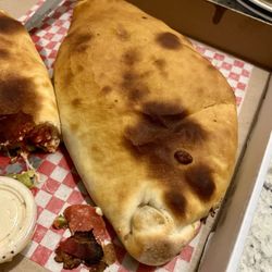 Mountain Shores Pizza - Panzerotti with pepperonis bacon and onions