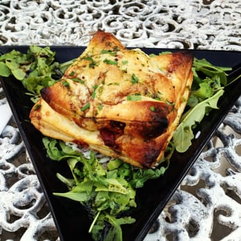 Gardeners Arms - Spinach, olive and mozzarella puff pastry parcel served on a bed of lemon rice with balsamic and basil oil dressed rocket leaves - Pubs Near Me - Oxford, OXF Gardeners Arms - Spinach, olive and mozzarella puff pastry parcel served on a bed of lemon rice with balsamic and basil oil dressed rocket leaves - Pubs Near Me - Oxford, OXF