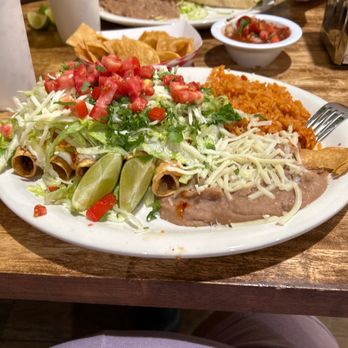 El Amigo #3 - Taquitos with rice and beans. In the back is fish tacos. - Mexican Near Me - Redondo Beach, California