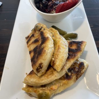 Lily and Liam Bistro - Green chili chicken panini with quinoa fruit on the side - Breakfast & Brunch Near Me - Rio Rancho, New Mexico