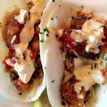 Bahama Breeze - Coconut Shrimp Tacos Flour tortillas filled with crispy coconut shrimp, tomato salsa, Sriracha aioli and cabbage-jicama slaw. DELICIOUS! - Bars Near Me - Miami, Florida Bahama Breeze - Coconut Shrimp Tacos Flour tortillas filled with crispy coconut shrimp, tomato salsa, Sriracha aioli and cabbage-jicama slaw. DELICIOUS! - Bars Near Me - Miami, Florida
