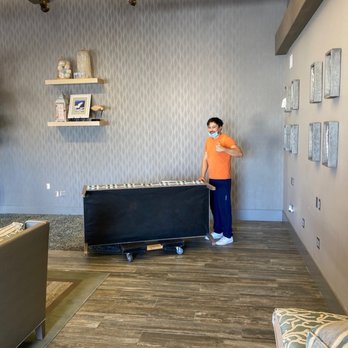 Total Moving - Jacob re-setting the room after the reception. - Movers Near Me