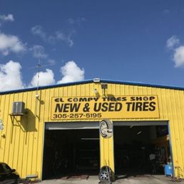 Exterior outside entrance of El Compy Tires Shop - Miami, Florida Exterior outside entrance of El Compy Tires Shop - Miami, Florida