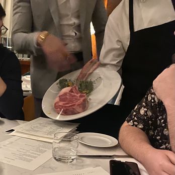 Americano - Manager&Chef showing the steak. - Wine Bars Near Me - Bayonne, New Jersey