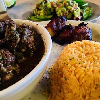 Mojitos - Norcross - Lunch Meal: Ox Tails, yellow rice, plantains, and avocado salad - Cuban Near Me - Norcross, Georgia