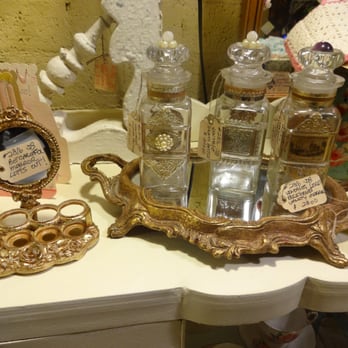 Goat Feathers Emporium - Vintage Perfume Containers and Mirror - Antiques Near Me - Boulder City, Nevada Goat Feathers Emporium - Vintage Perfume Containers and Mirror - Antiques Near Me - Boulder City, Nevada