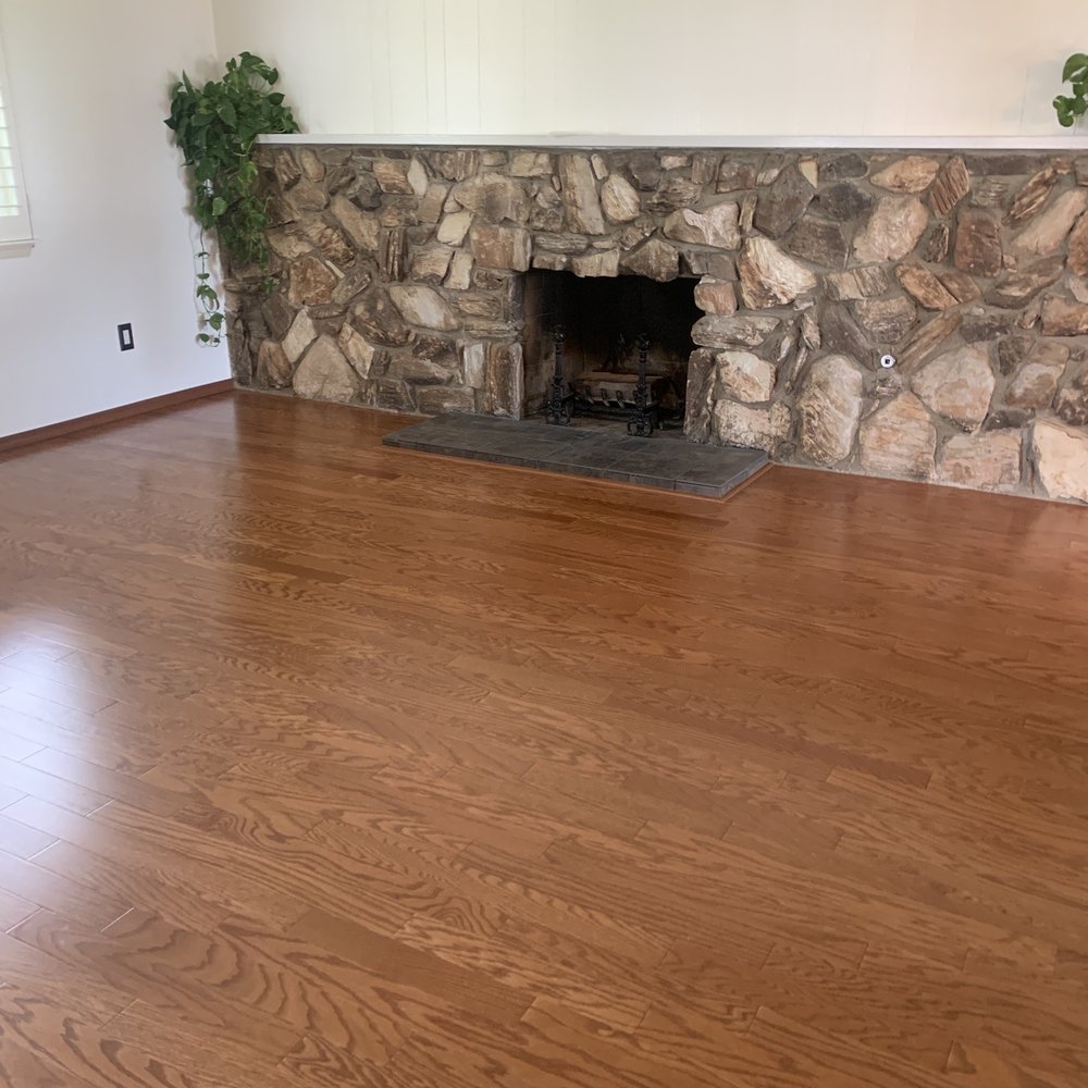 Before: Dark rock fireplace