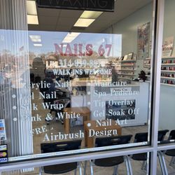 Nails 67 - Outside of the shop next to Schnucks behind the Wendy's on Lindberg.