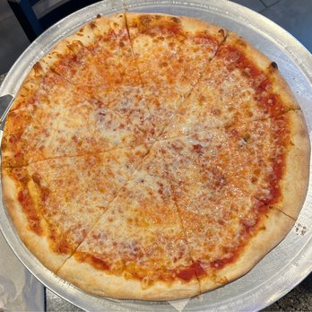 Salvatore's Cucina - Large plain cheese pizza well done - cheese is on the saltier side, light char, thick doughy crust, sauce was a little tangy. Solid pizza - Pizza Near Me - Levittown, Pennsylvania Salvatore's Cucina - Large plain cheese pizza well done - cheese is on the saltier side, light char, thick doughy crust, sauce was a little tangy. Solid pizza - Pizza Near Me - Levittown, Pennsylvania