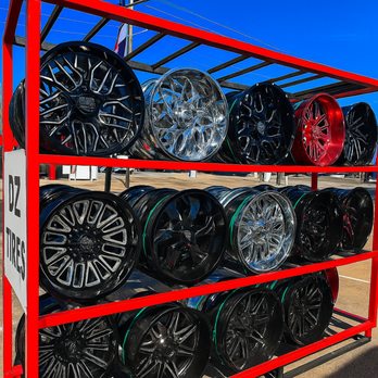 DZ Tires - Open‑Air Exhibition: Premium wheels stacked outdoors under the Texas sun, waiting to enhance your ride. Discover them at DZTIRES. #OutdoorS - Auto Repair Near Me - Fort Worth, Texas DZ Tires - Open‑Air Exhibition: Premium wheels stacked outdoors under the Texas sun, waiting to enhance your ride. Discover them at DZTIRES. #OutdoorS - Auto Repair Near Me - Fort Worth, Texas