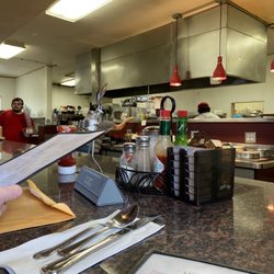 Real Deal Cafe - Watching the kitchen hustle to a full house!