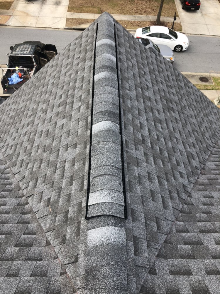 Slide of MTZ Roofing
