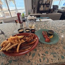 Lobster. Blackened shrimp and flounder. Fries. Crown and ginger. Lobster. Blackened shrimp and flounder. Fries. Crown and ginger.