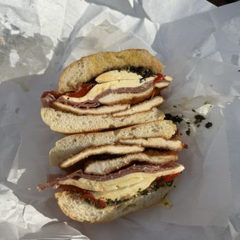 Parisi Bakery - The Dennis with roasted peppers on a roll - Bakeries Near Me - New York, New York Parisi Bakery - The Dennis with roasted peppers on a roll - Bakeries Near Me - New York, New York