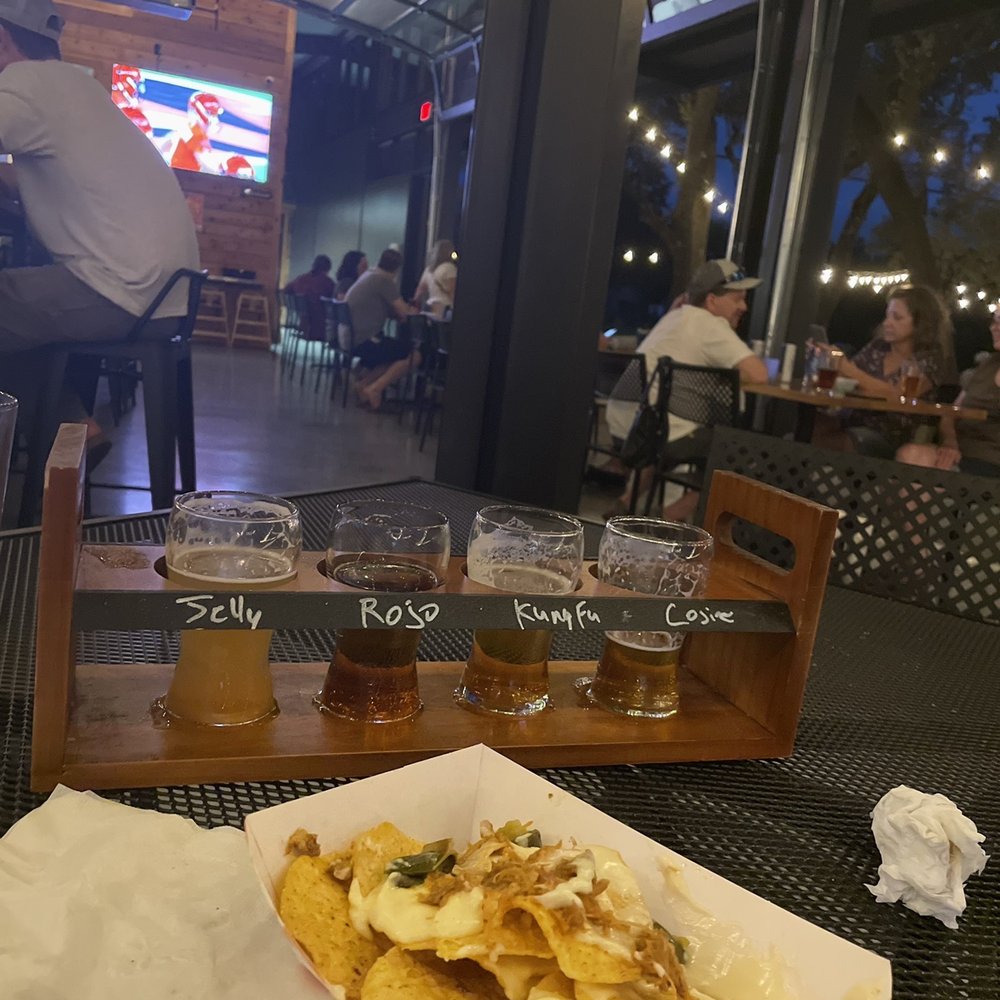 The Good Lot - inside, one tv, flight, nachos - Beer Gardens Near Me - Cedar Park, Texas The Good Lot - inside, one tv, flight, nachos - Beer Gardens Near Me - Cedar Park, Texas
