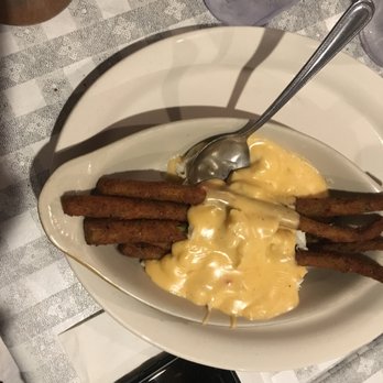 Doe's Eat Place - Fried asparagus with crabmeat and cheese - Steakhouses Near Me - Baton Rouge, Louisiana Doe's Eat Place - Fried asparagus with crabmeat and cheese - Steakhouses Near Me - Baton Rouge, Louisiana