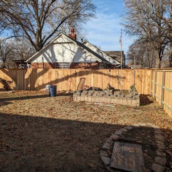 WLB Fencing - a backyard with a fire pit - Pressure Washers Near Me WLB Fencing - a backyard with a fire pit - Pressure Washers Near Me