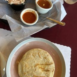 Revuelta Pupusa with curtido and two salsas... a traditional salsa de tomate (tomato sauce) and a spicy version! Revuelta Pupusa with curtido and two salsas... a traditional salsa de tomate (tomato sauce) and a spicy version!