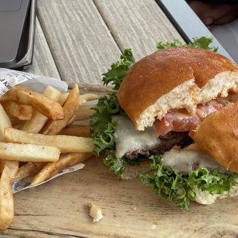 Coral Reef Bar and Grill - SmashBurger with Provolone and fries - American Near Me - Orlando, Florida Coral Reef Bar and Grill - SmashBurger with Provolone and fries - American Near Me - Orlando, Florida