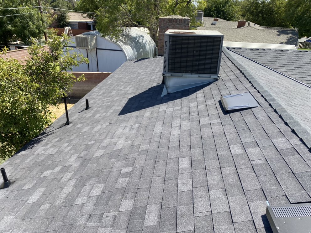 Slide of Modern Roofers and Restoration