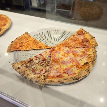 Reggiano's - By the slice selection - Pizza Near Me - Port Coquitlam, British Columbia Reggiano's - By the slice selection - Pizza Near Me - Port Coquitlam, British Columbia