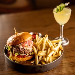 Corner Bar - Corner Burger (house ground beef, havarti, tomato jam, cucumber, romaine, red onion, tzatzki) with spiced fries