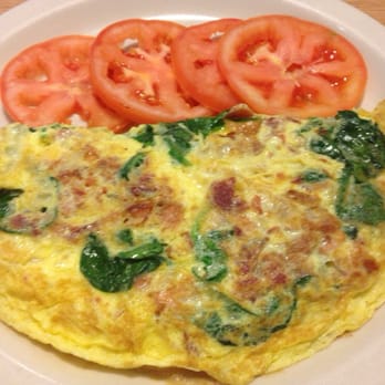 The Boardwalk Cafe - Popeye Omelette with sliced tomatoes instead of Hash Browns - American Near Me - Webster Groves, Missouri The Boardwalk Cafe - Popeye Omelette with sliced tomatoes instead of Hash Browns - American Near Me - Webster Groves, Missouri