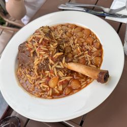 Braised Bone-In Lamb Shank Stifado