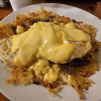 What's Cookin' Downtown - Hashbrowns with sausage, jalapeños, two over easy eggs, and American cheese - American Near Me - Aiken, South Carolina What's Cookin' Downtown - Hashbrowns with sausage, jalapeños, two over easy eggs, and American cheese - American Near Me - Aiken, South Carolina