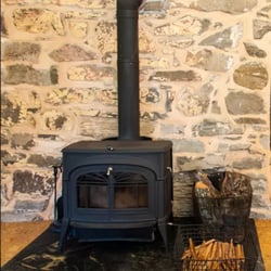 Thornwood Guesthouse - Wood-burning stove in the kitchen.