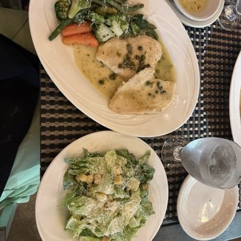 Forchetta Italian Eatery - Chicken piccata with Caesar salad - Italian Near Me - Largo, Florida Forchetta Italian Eatery - Chicken piccata with Caesar salad - Italian Near Me - Largo, Florida