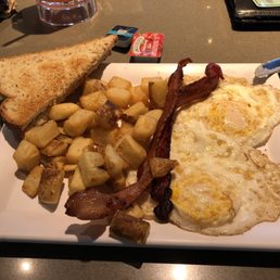 Standard breakfast - eggs were supposed to be over medium but... Standard breakfast - eggs were supposed to be over medium but...