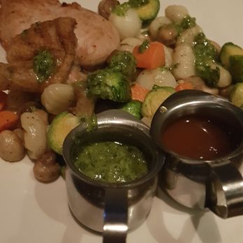 The Keg Steakhouse + Bar - Oven roasted chicken with gnocchi, brussel sprouts, mushrooms etc... - Steakhouses Near Me - Edmonton, Alberta The Keg Steakhouse + Bar - Oven roasted chicken with gnocchi, brussel sprouts, mushrooms etc... - Steakhouses Near Me - Edmonton, Alberta