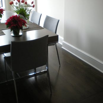 Stanley Flooring - a dining room table and chairs - Flooring Near Me