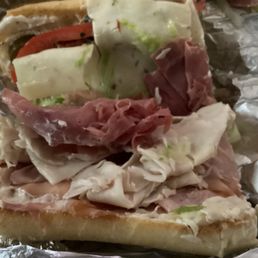 Yep, that's what a Turkey, Corn-beef and Ham sandwich looks like, that's it.